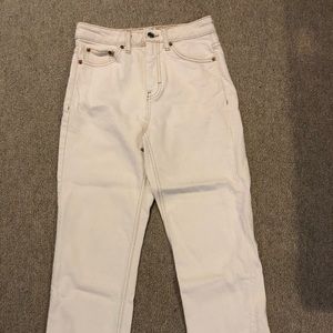 Top shop cream straight jeans with raw hem.